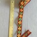 Indian haberdashery ribbon braid trim - Gold metallic, Red, Green satin thread with Shish Mirror detail