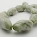 Peace Jade Beads 20mmx11mm Twisted-R