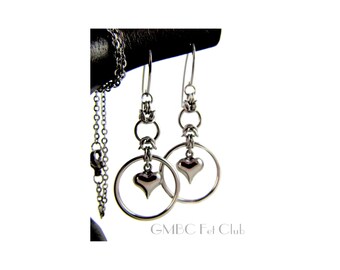 A steel heart captured by a circle of steel - Earrings or Pendant