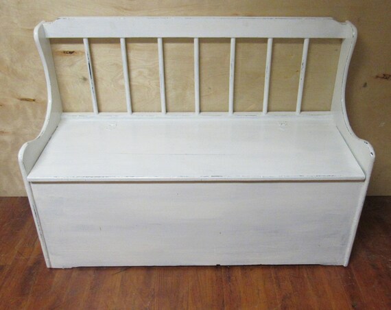 Bench with storage compartment