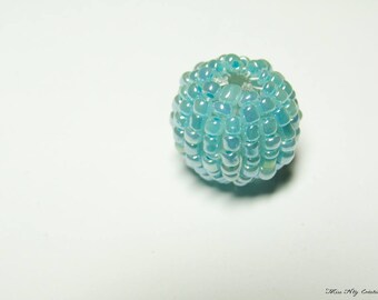 5 Indian beads woven with several beads