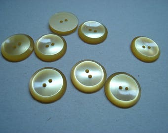 beveled yellow cast buttons