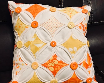 Fall themes cathedral window pillows.