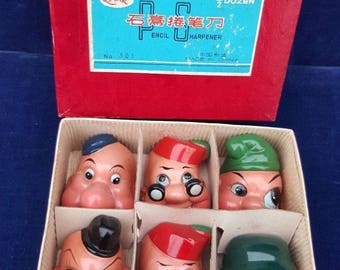 Box of 6 vintage Lark gnome head pencil sharpeners