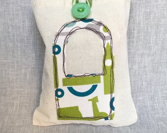 Carrier bag pouch to pop in your handbag.