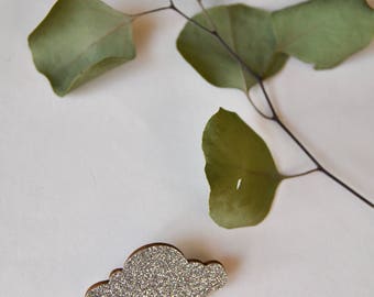 This brooch glittery gold