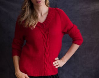 Cozy, warm, red sweater hand knitted