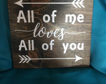 Wood sign "All of Me Loves All of You"