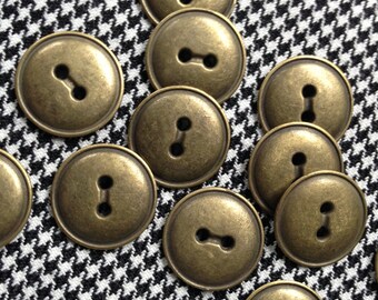 12 vintage metal buttons