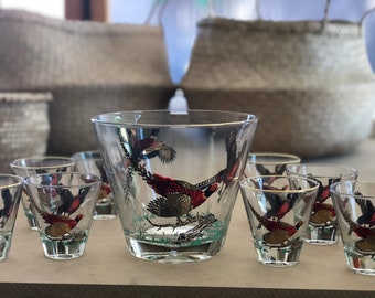 8 vintage pheasant Hazel Atlas shot glasses with a matching ice bucket