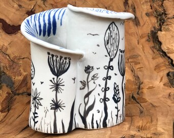 Porcelain vase with contemporary design.