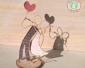 Enamored on wood slice - Machangos Paper Art