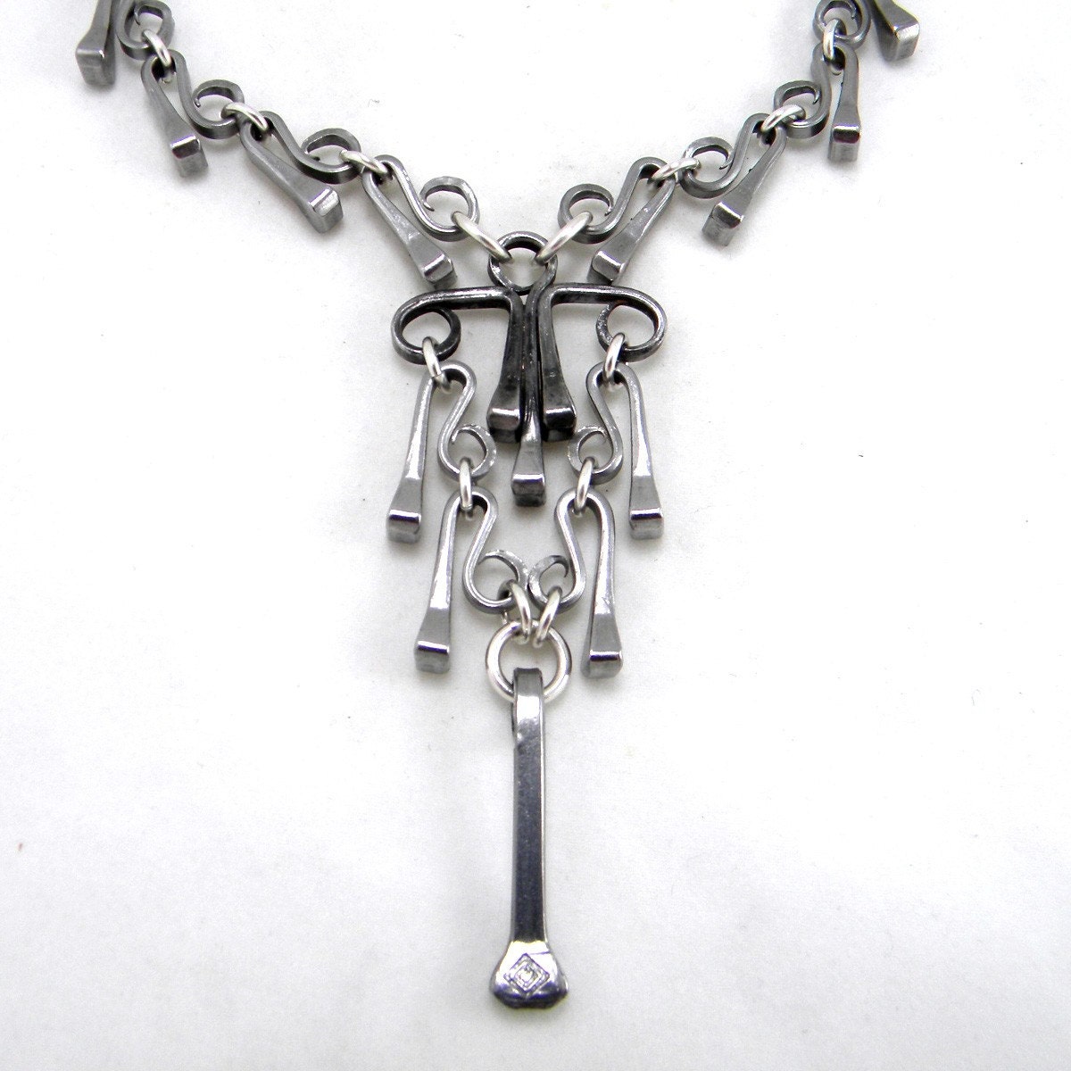 Horseshoe Nail Necklace with Chandelier Pendant
