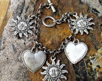 90s distressed silver tone sun and hearts charm bracelet