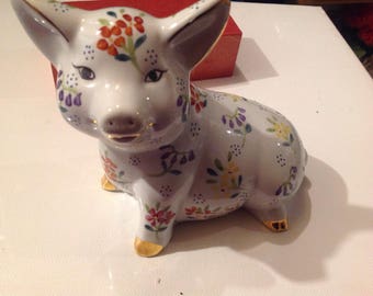 Vintage porcelain pig with flowers