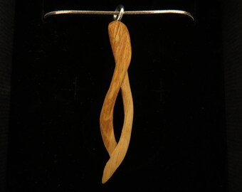 Handcarved wooden pendant