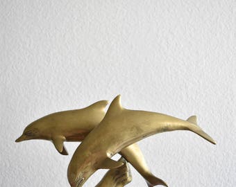solid brass dolphin figurine / paperweight / nautical