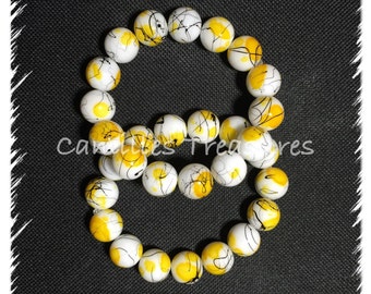 Black,yellow and white stretch bracelet.