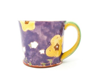 Puffy Floral Earthenware mug. Wheel thrown and altered, food safe mug made by Kaitlyn Brennan. This is a big handmade mug perfect for coffee