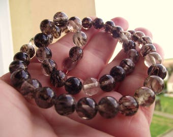 4 BLACK TOURMALINE 8MM ROUND BEADS.