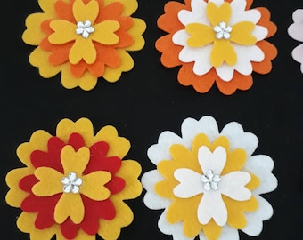 Flowers - Yellow assortment. pack of 4 with a little sparkle.