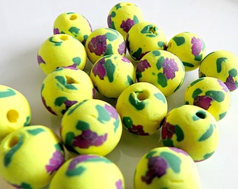 Deep purple lilac with yellow polymer clay bead