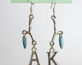 Silver twig, light blue daggers and silver Ak dangle earrings