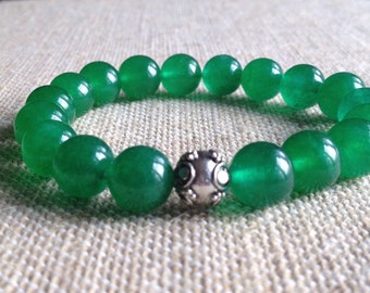 10mm Green Jade stretch bracelet with a Sterling Silver Bali Bead