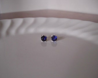 Tiny sapphire stud earrings set in sterling silver; sapphire post earrings; small sapphire earrings silver; september birthstone