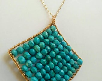 Turquoise wire wrapped pendant necklace