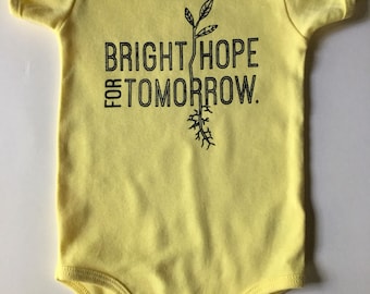 Bright Hope for Tomorrow, size 12-18 Months, Screen printed Baby one piece/romper, yellow with Black print