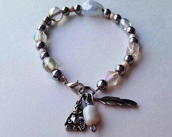 Beaded bracelet, charm bracelet, silver, white, stackable, feather, buddha, handmade