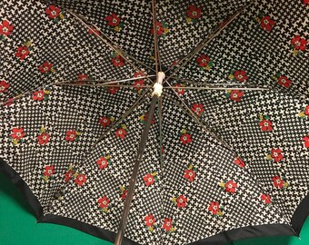 1970's Henryson T.U.F.I. 1970's umbrella. Navy, White with red/ yellow flowers