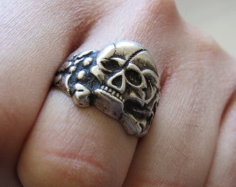 Vintage sterling silver (rock or biker's ) ring shaped as skull and cross bones, vintage skull ring, silver skull ring, cool skull ring.