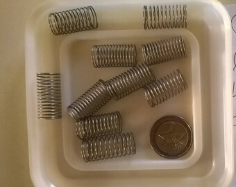 376) set of 12 metal springs