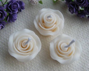 30x small Rose floating candles 3.5cm size