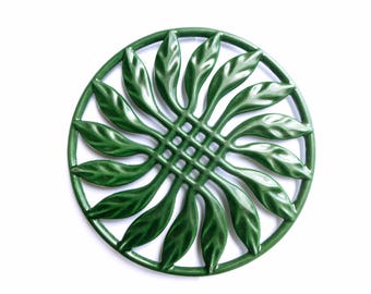 Below flat green enameled cast iron vintage french - heavy round pot holder trivet country kitchen table decor rustic