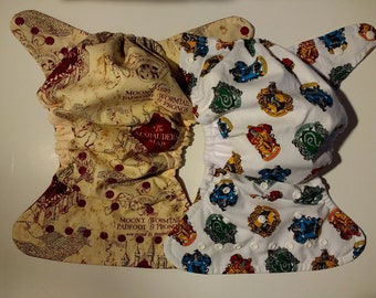 SassyCloth one size pocket diaper with wizard school cotton print. Made to order.