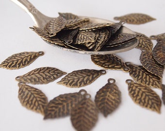 30 Metal Leaf Stampings Charms Leaf Shape Embossed Antique Brass Size 20 x 9mm Hole 1mm