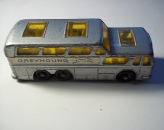 matchbox-lesney 1960's greyhound bus-coach-no.66,old silver paint w/greyhound logo's-black plastic wheels