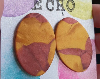 Bronze and gold oval studs