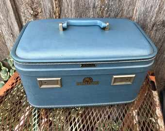 Vintage Light Blue Wheary Train Case/Overnight Suitcase with a Purdue Sticker