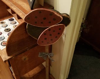 Primitive lady bug garden stake