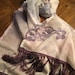 Shawl with Fringe. Shades of Purple. Fleur de lis designs.