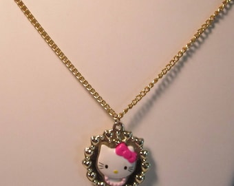 Hello Kitty, Sanrio Pendant, and Necklace. (#582)