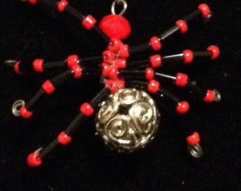 Four Spider beaded necklaces
