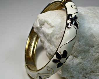 Signed JTF Sequin Gold Tone White, Gold and Black Floral Enamel Clamper Bangle Bracelet