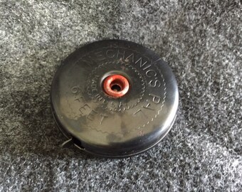 Vintage Mechanic's Pal retracting metal tape measure