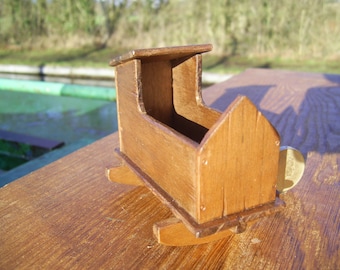 1:12th scale dollhouse miniature Tudor or later rocking cradle.