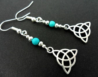 A pair of tibetan silver & turquoise bead celtic knot dangly earrings. new.